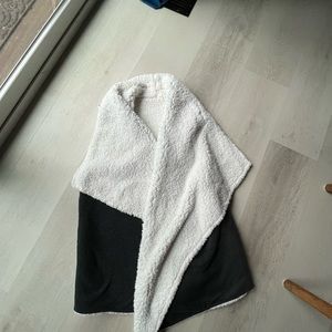 new condition . never worn. soft. reversible